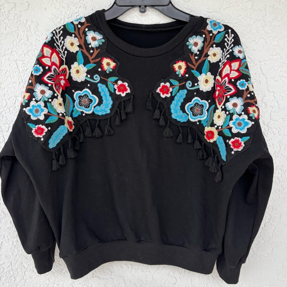 Black embroidered sweatshirt with fringe